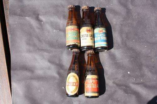 5 SMALL GLASS BOTTLES