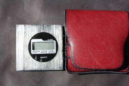 QUARTZ ALARM IN LEATHER COVER