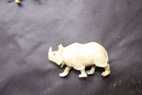 CARVED IVORY RHINO - 80 MM LONG -45 MM HIGH