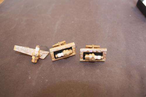 PAIR OF CUFFLINKS WITH CHAMPION SPARK PLUG AND TIE CLIP