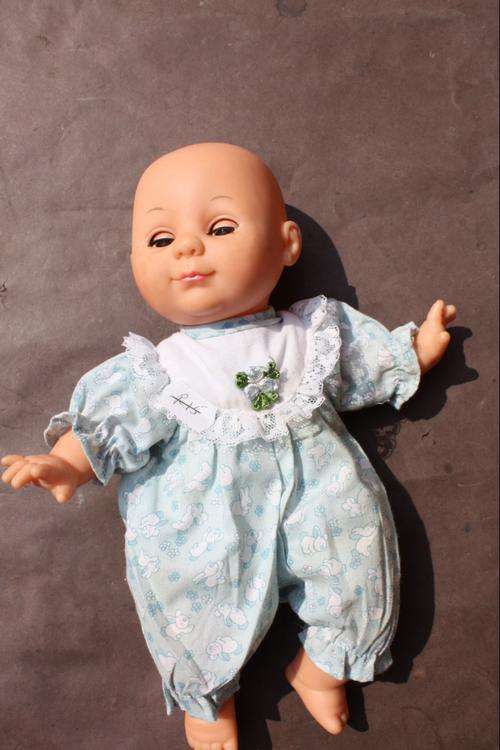 DOLL - 24 CM - CAN OPEN AND CLOSE EYES - SOFT BODY