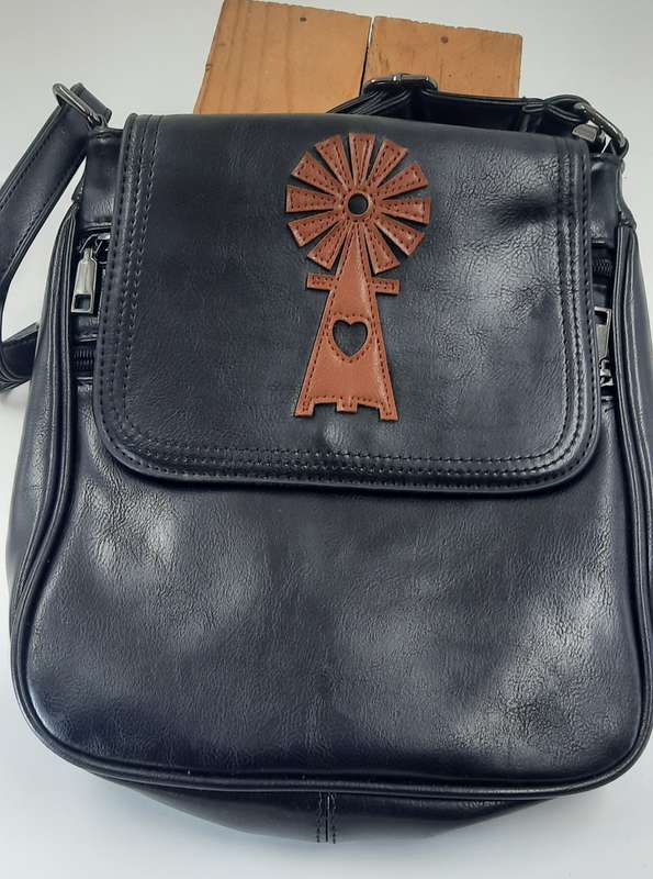 STUNNING sling bag in BLACK! @@##WINDMILL DESIGN##@@