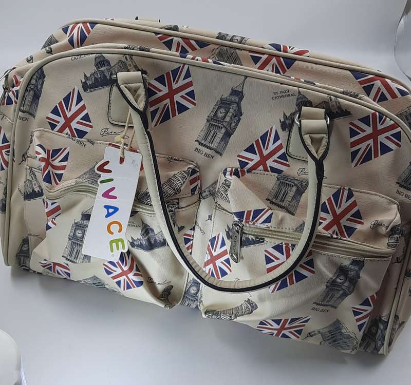 LARGE TRAVEL BAG BY VIVACE!LONDON PRINT ON OFF WHITE OR LIGHT CREAM!!