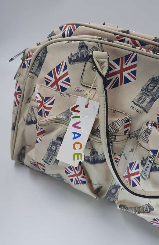 LARGE TRAVEL BAG BY VIVACE!LONDON PRINT ON OFF WHITE OR LIGHT CREAM!!