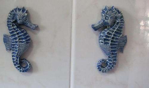 set of sea horses for use anywhere,also in bathrooms,kitchens etc.with double sided tape.