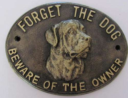 forget the dog beware of the owner.resin sign