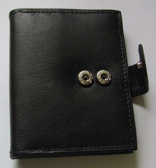 credit card holder ! leather! holds 18 cards.