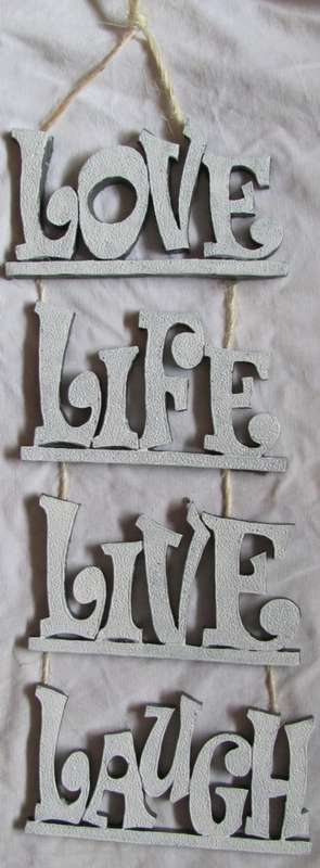 LOVE LIFE LIVE LAUGH hanging word sign with twine.resin.