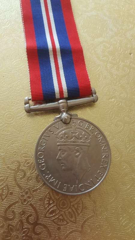 WW2 Medal and paperwork of the person's whole military history