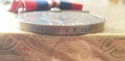 WW2 Medal and paperwork of the person's whole military history