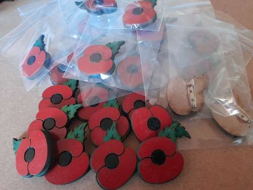 Wooden poppy pins for remembrance day
