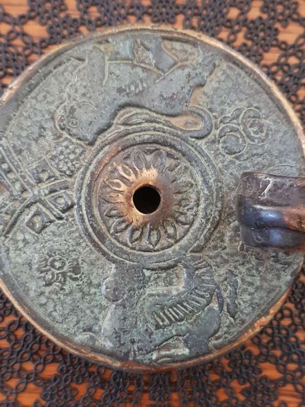 Antique Bronze Greek Oil Lamp showing the Griffin