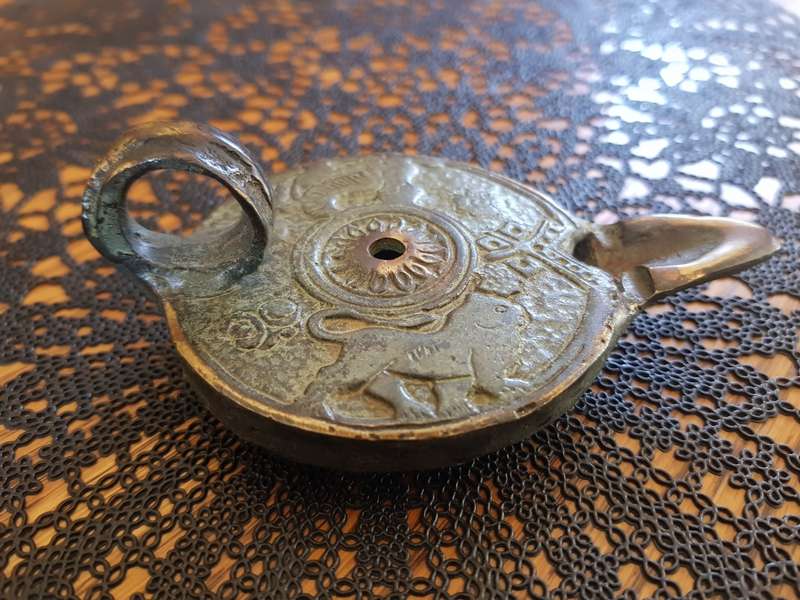 Antique Bronze Greek Oil Lamp showing the Griffin