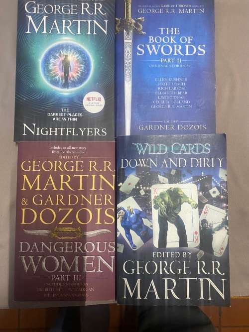 George R. R . Martin. Four books by or edited by him.
