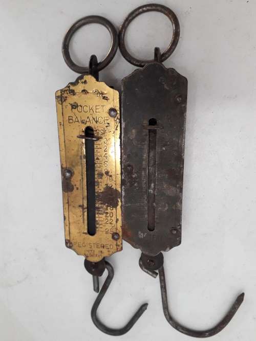 Two spring balance scales