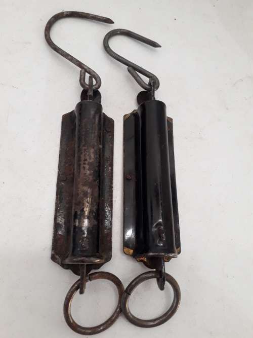 Two spring balance scales