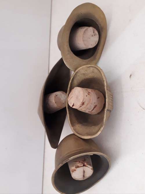 Brass Helmets and Hats Top set four Bottle Corks
