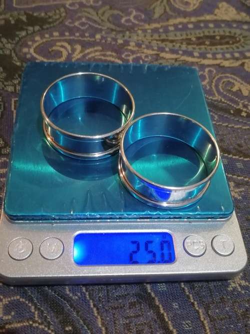A Pair Of Sterling Serviette rings