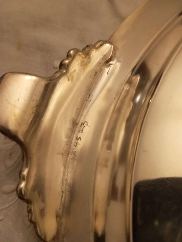 A vintage silver plated footed tray