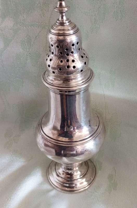 An exceptional early Georgian sterling sugar sifter