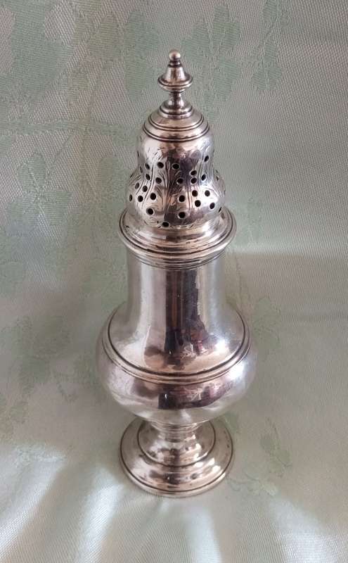 An exceptional early Georgian sterling sugar sifter