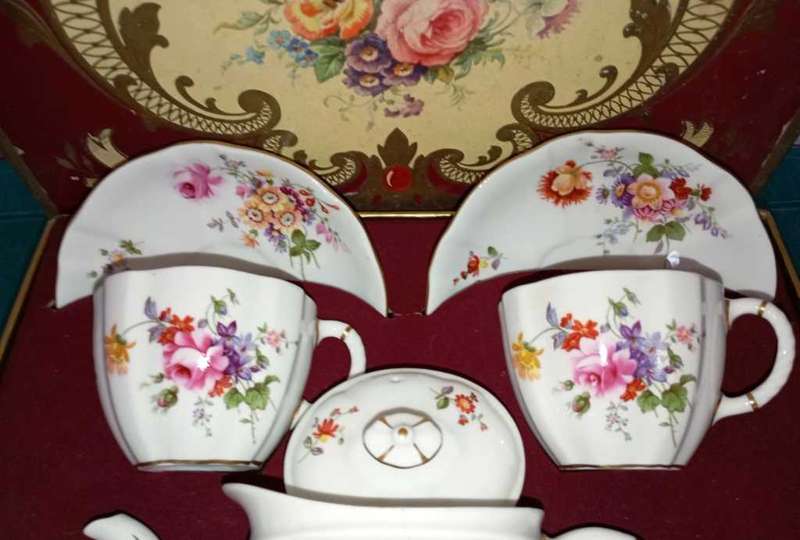 A boxed crown Derby tea set for 2