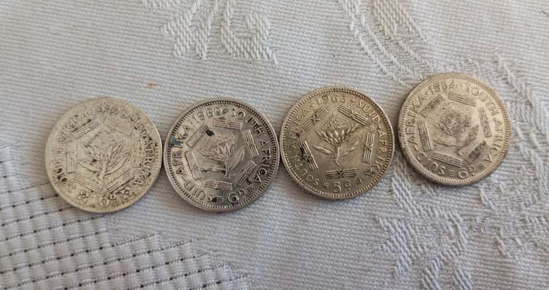 A set of four 6d silver assorted union coins