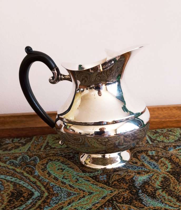 A beautiful Edwardian styled silver plate water jug
