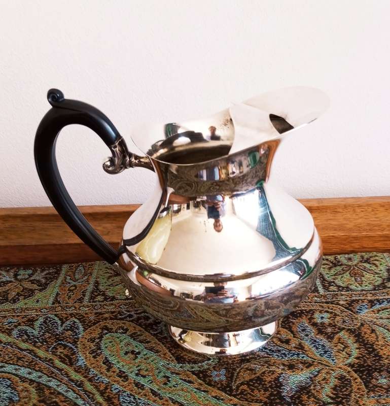 A beautiful Edwardian styled silver plate water jug