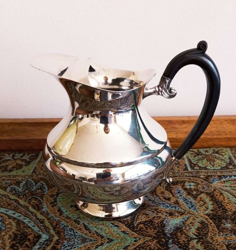 A beautiful Edwardian styled silver plate water jug