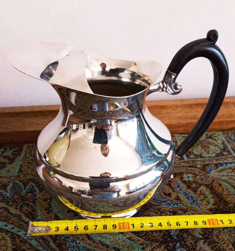 A beautiful Edwardian styled silver plate water jug