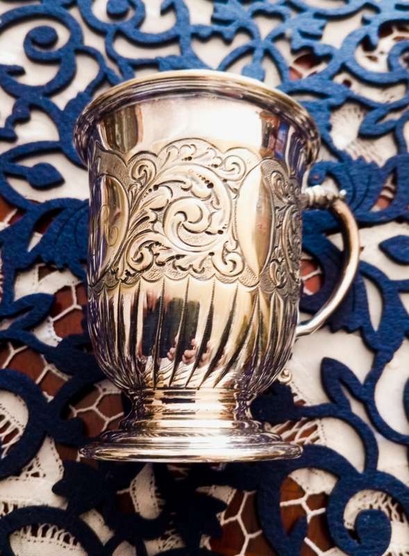 A lovely vintage silver plate christening mug
