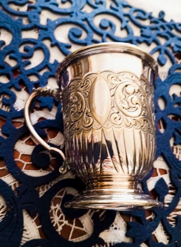 A lovely vintage silver plate christening mug