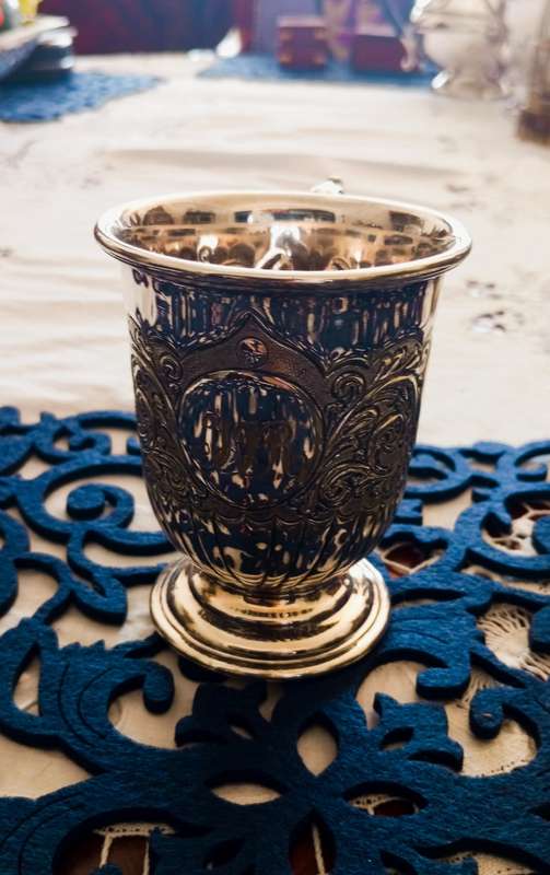 A lovely vintage silver plate christening mug