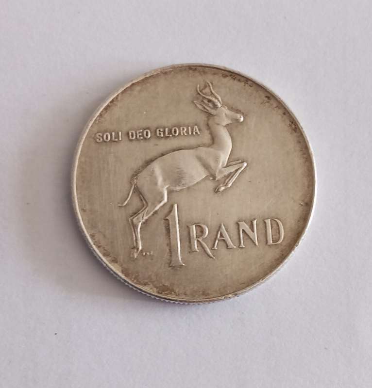 An SA Afrikaans script silver R1 coin