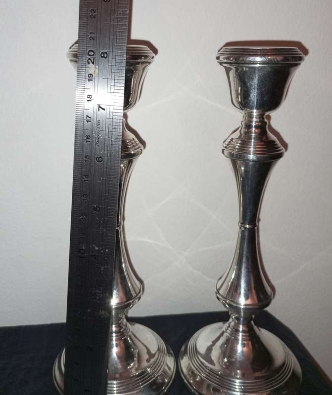 A lovely pair of silver candlesticks