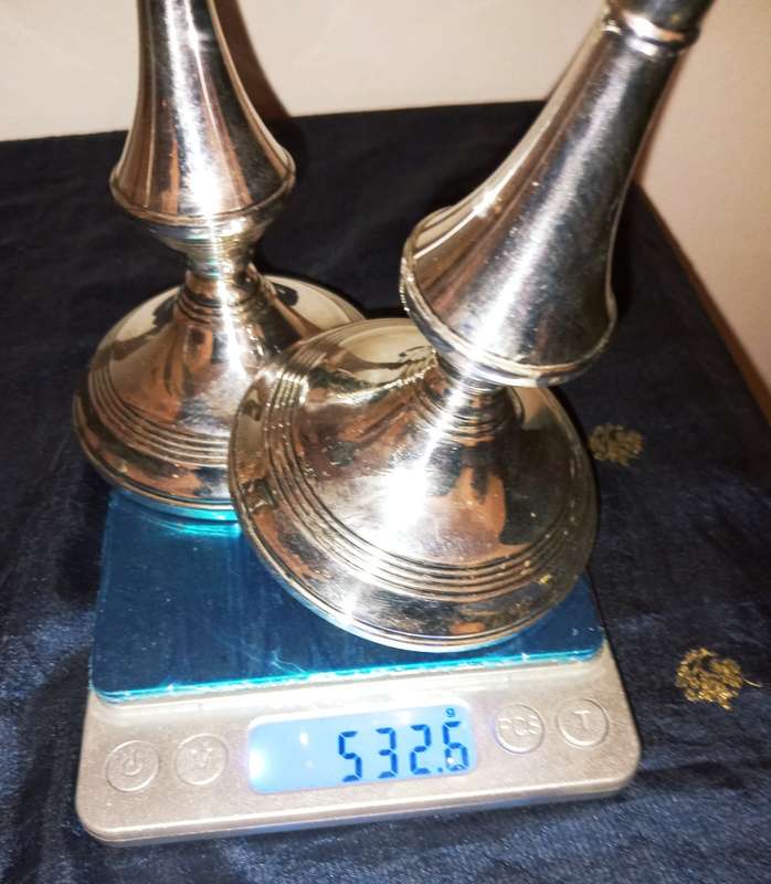 A lovely pair of silver candlesticks