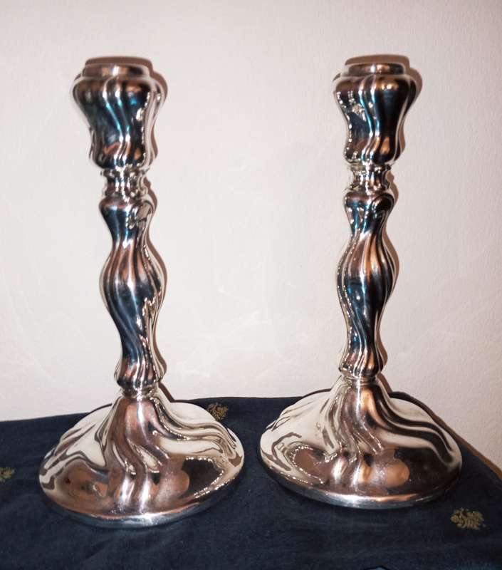 A lovely pair of hallmarked Beidermier silver candlesticks
