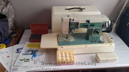 FRICK HAND CRANK SEWING MACHINE WITH LIGHT