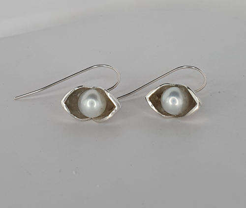 Pearls in silver earrings