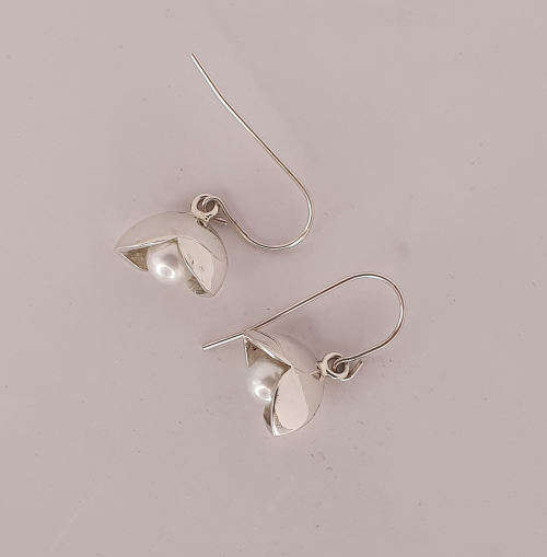 Pearls in silver earrings