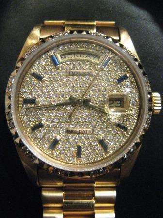ROLEX - 18ct GOLD ROLEX DAY DATE WATCH ENCRUSTED WITH DIAMONDS AND BLUE SAPPHIRE NUMERALS