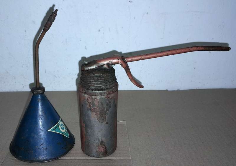 2 OIL DISPENSING CANS - SEE PICTURES
