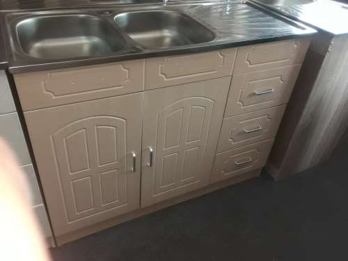 Kitchen  cabinets with sink and tap