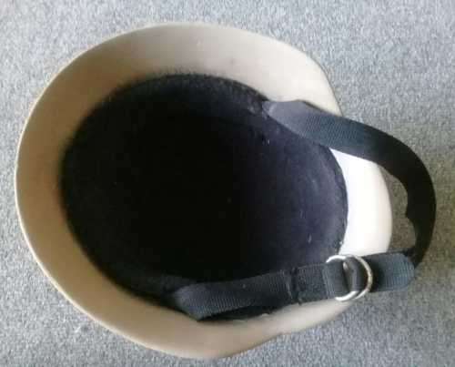 Classic German `steel` helmet - lightweight made from fibreglass with chinstrap. Size about 59cm.