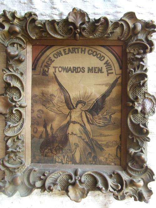 1850 PEACE AND GOODWILL" FLAG CENTRE PIECE IN X-TREAMLY OLD FRAME BEHIND GLASS