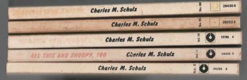 FIVE CHARLIE BROWN PAPERBACKS BY CHARLES M SCHULZ
