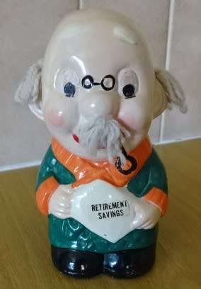 VINTAGE OLD MAN PIGGY BANK WITH YARN HAIR. RETIREMENT FUND