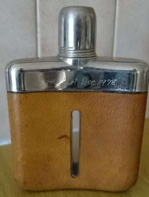 STAINLESS STEEL AND PIGSKIN DECANTER (MADE IN ENGLAND (INSCRIBED 1978)