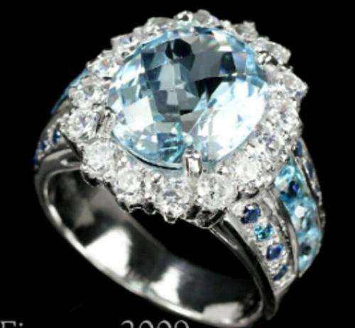 Natural Oval AAA Sky Blue Topaz & White- Blue CZ Ring